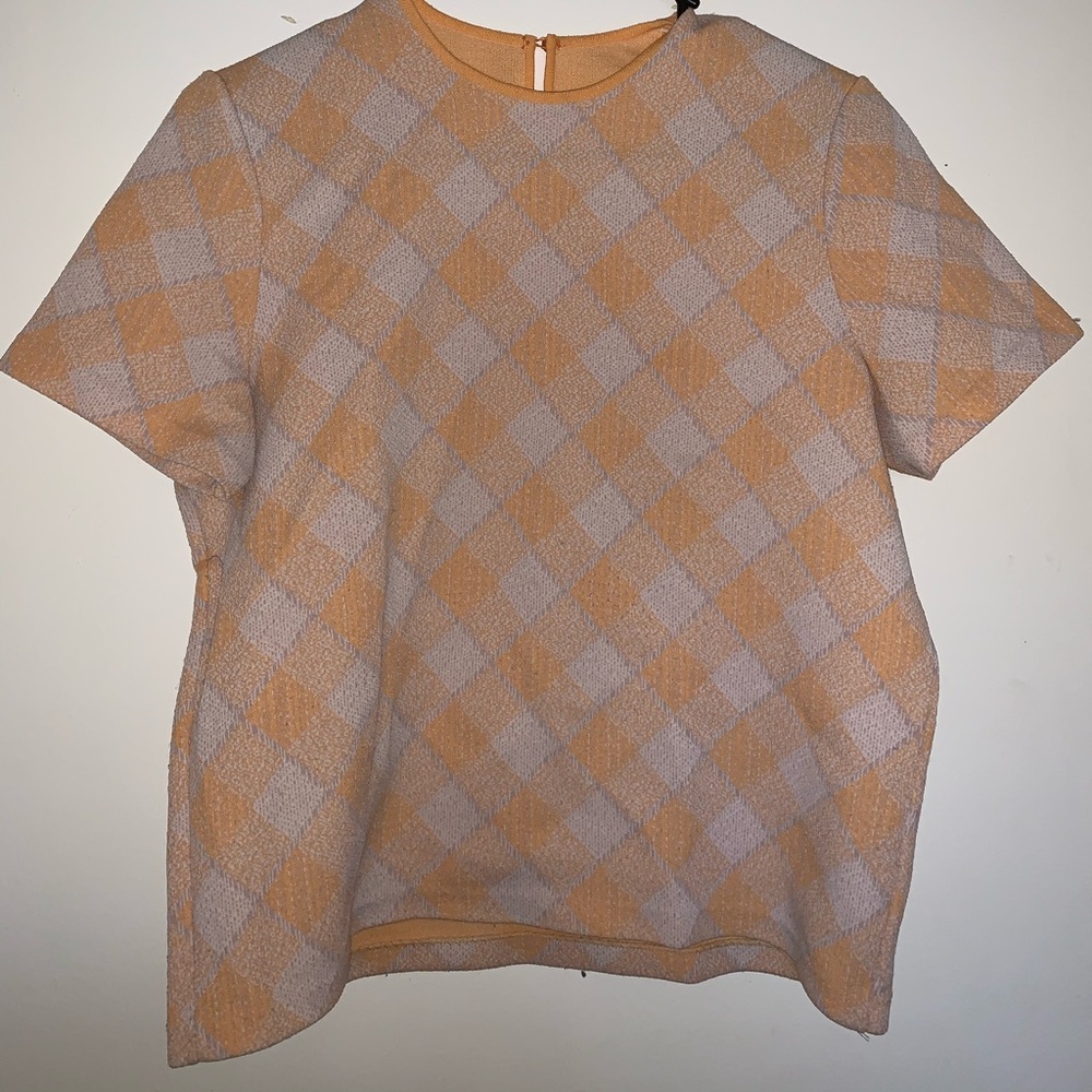 Peach and white plaid shirt